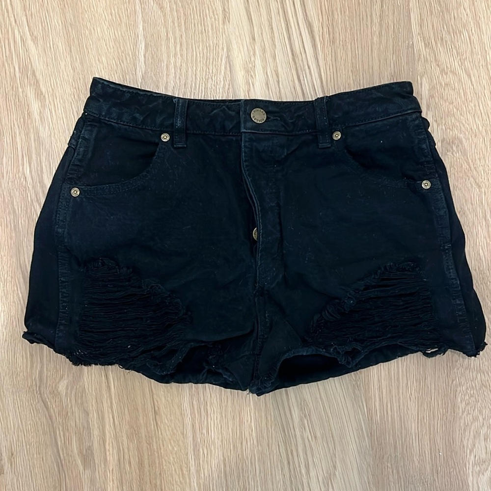 Rolla’s Original Short in black distressed denim. Size 28